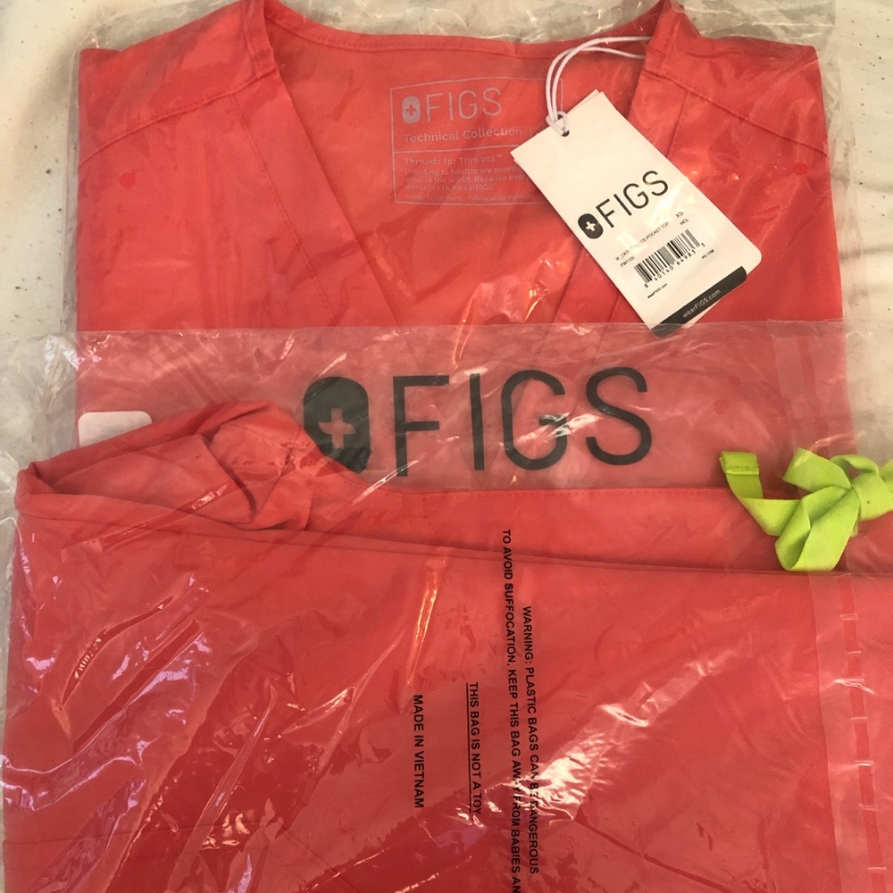 Hot Coral Casma scrub top and Hot Coral Yola scrub pants (petite)